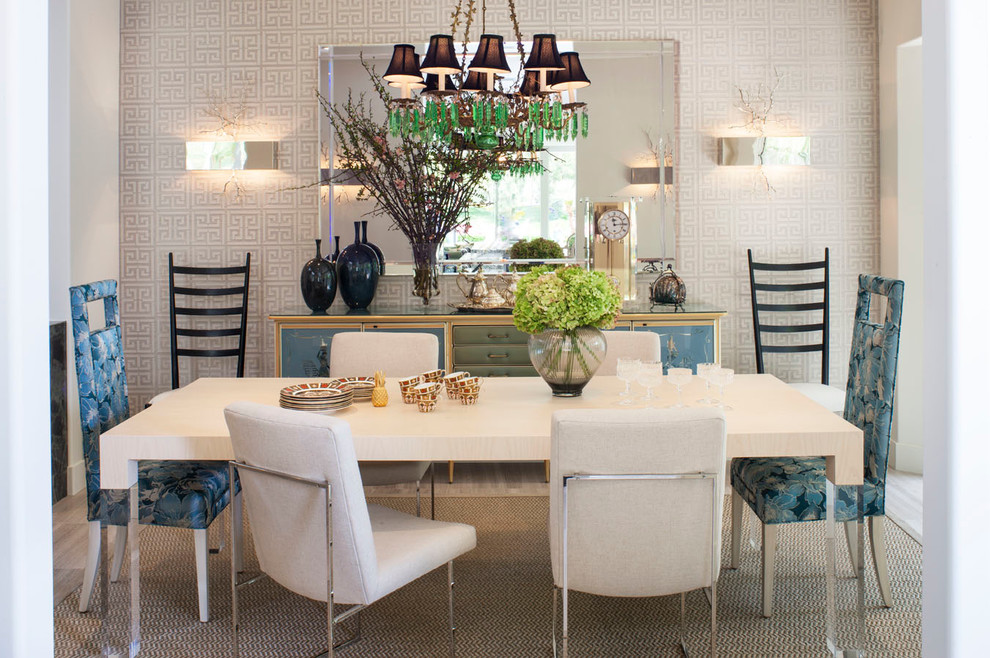 This is an example of a transitional dining room in Los Angeles with beige walls.