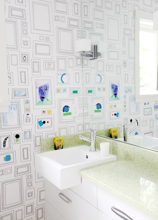 This is an example of a mid-sized modern kids bathroom in Vancouver with a drop-in sink, flat-panel cabinets, white cabinets, recycled glass benchtops, an alcove tub, a shower/bathtub combo, a wall-mount toilet, green tile, porcelain tile, white walls and mosaic tile floors.