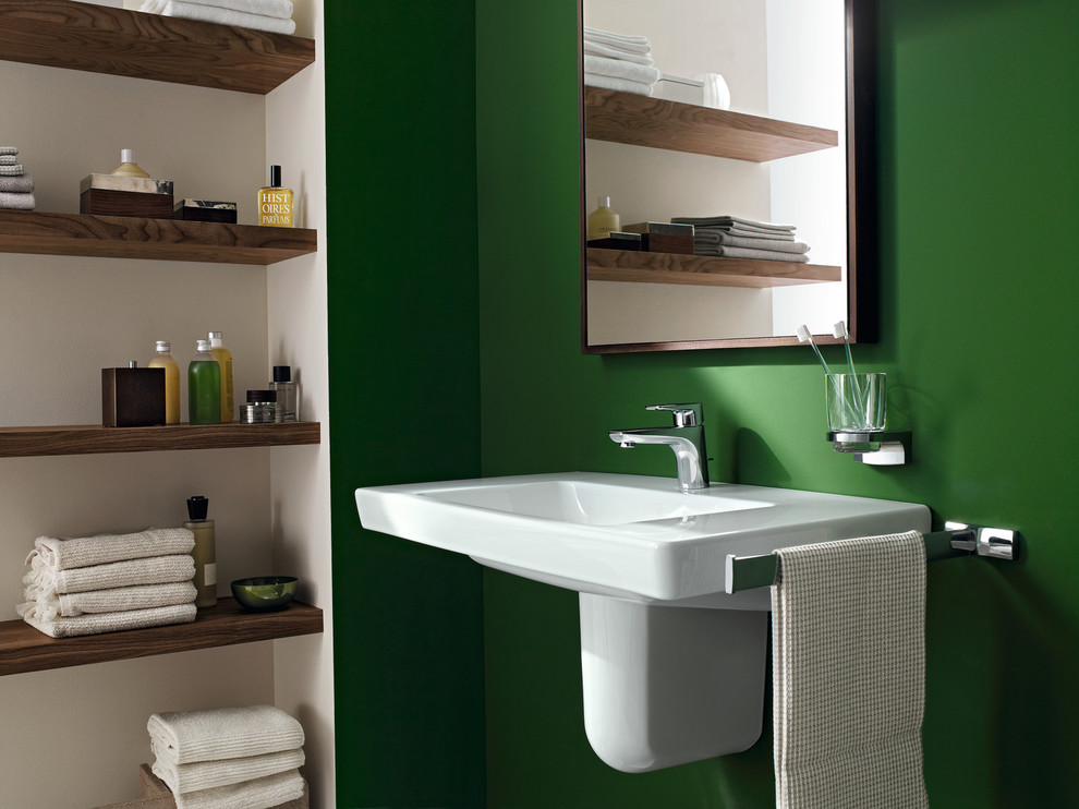 Design ideas for a mid-sized contemporary 3/4 bathroom in Boston with flat-panel cabinets, medium wood cabinets, green walls and a wall-mount sink.