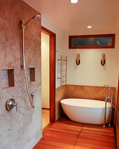 Inspiration for a mid-sized asian master bathroom in Other with furniture-like cabinets, medium wood cabinets, marble benchtops, an open shower, medium hardwood floors and a freestanding tub.
