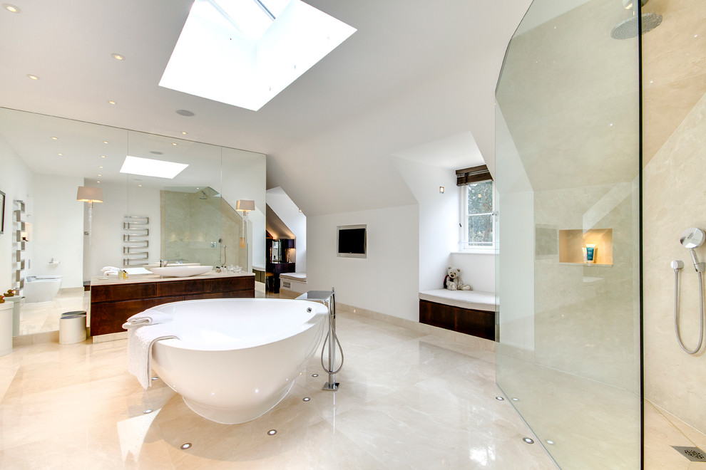Inspiration for a contemporary bathroom in Surrey with a vessel sink, flat-panel cabinets, dark wood cabinets, a freestanding tub, an open shower, beige tile, white walls, beige floor and an open shower.