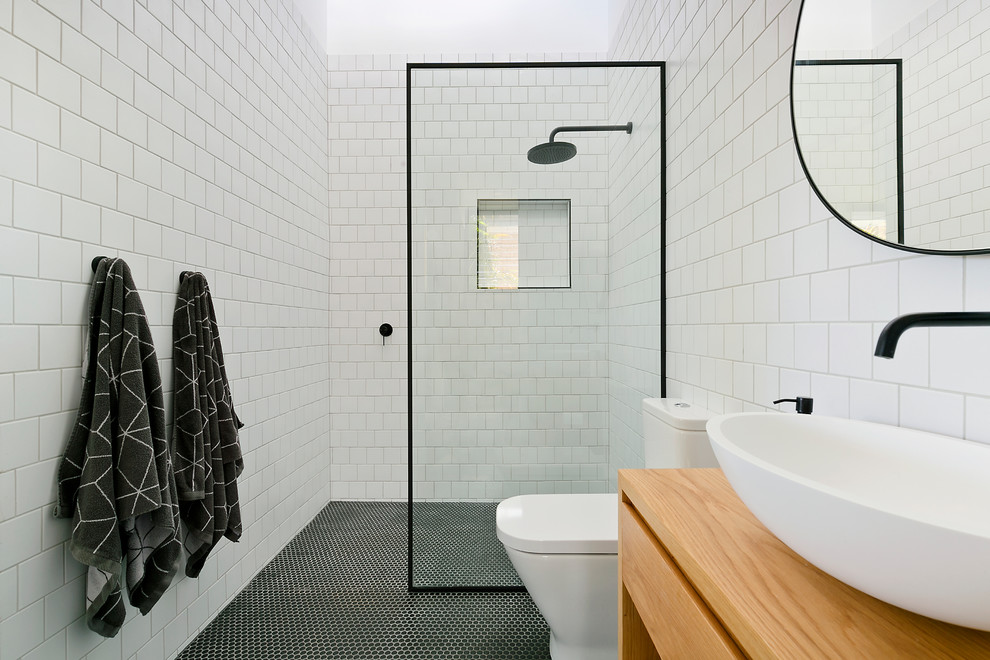Mid-sized contemporary master wet room bathroom in Sydney with white tile and ceramic tile.