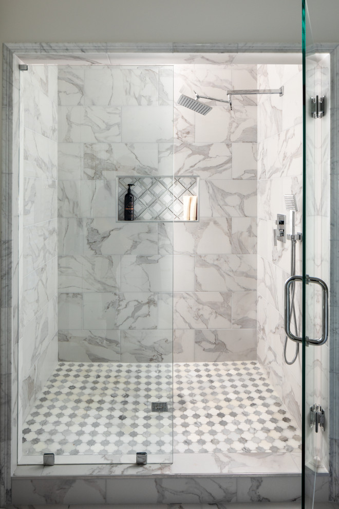 Freestanding bathtub - large transitional master white tile and marble tile ceramic tile, white floor and double-sink freestanding bathtub idea in Atlanta with raised-panel cabinets, white cabinets, a two-piece toilet, gray walls, an undermount sink, quartz countertops, a hinged shower door, white countertops and a built-in vanity