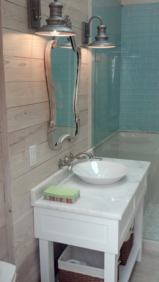 Inspiration for a small transitional master bathroom in Nashville with a vessel sink, shaker cabinets, white cabinets, marble benchtops, an open shower, blue tile, subway tile, beige walls and porcelain floors.