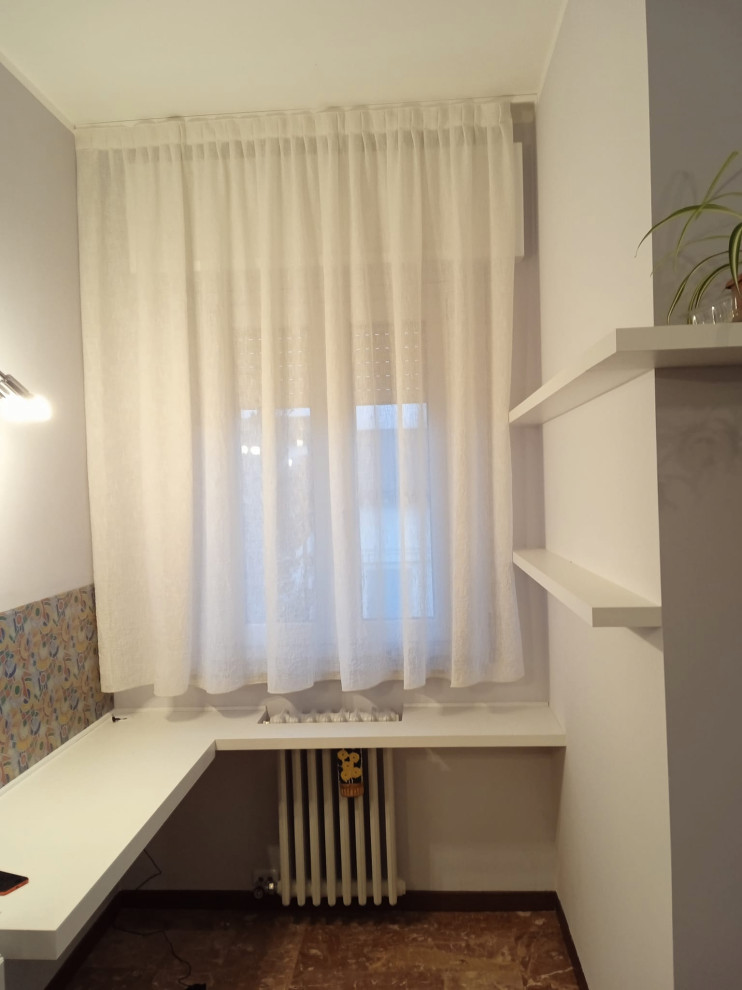 Living con annessa zona studio e tendaggi