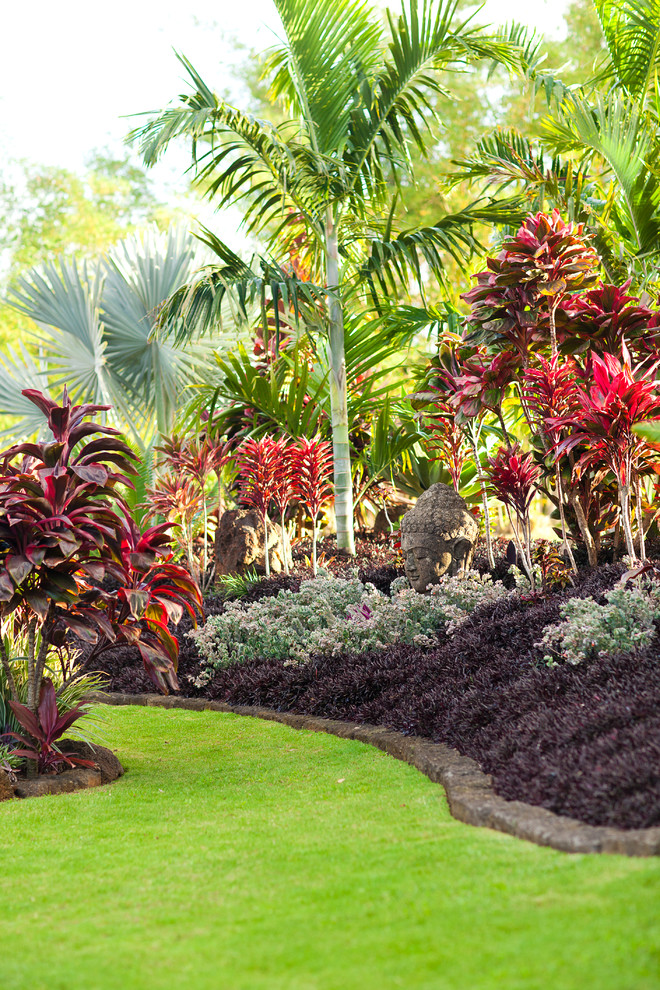 Inspiration for a tropical backyard landscaping in Hawaii.