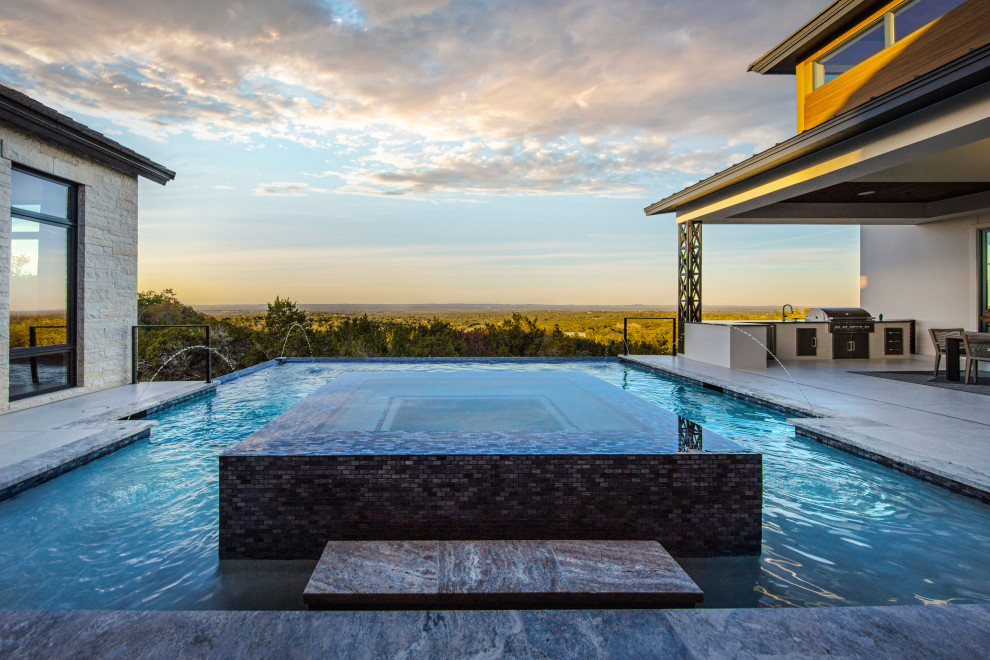 Inspiration for a transitional pool remodel in Austin