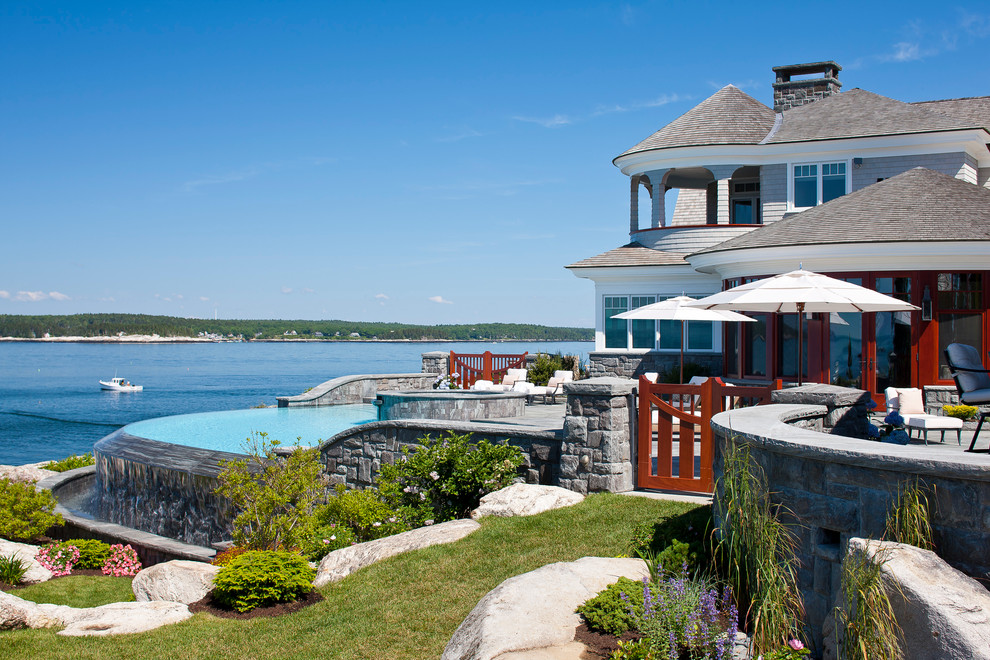 This is an example of a beach style exterior in Portland Maine.