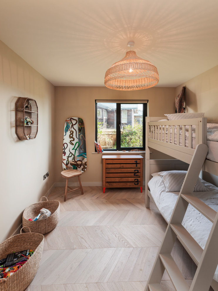 Example of a large beach style kids' room design in Devon