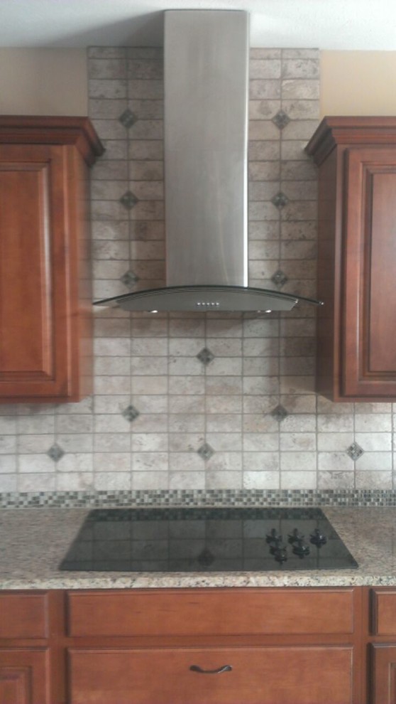 Example of a transitional kitchen design in Chicago