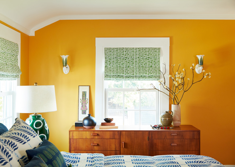 Inspiration for a mid-sized midcentury master bedroom in San Francisco with orange walls.