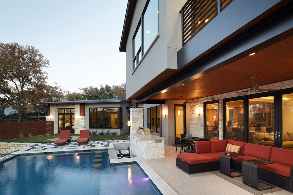 Design ideas for a contemporary backyard pool in Austin.