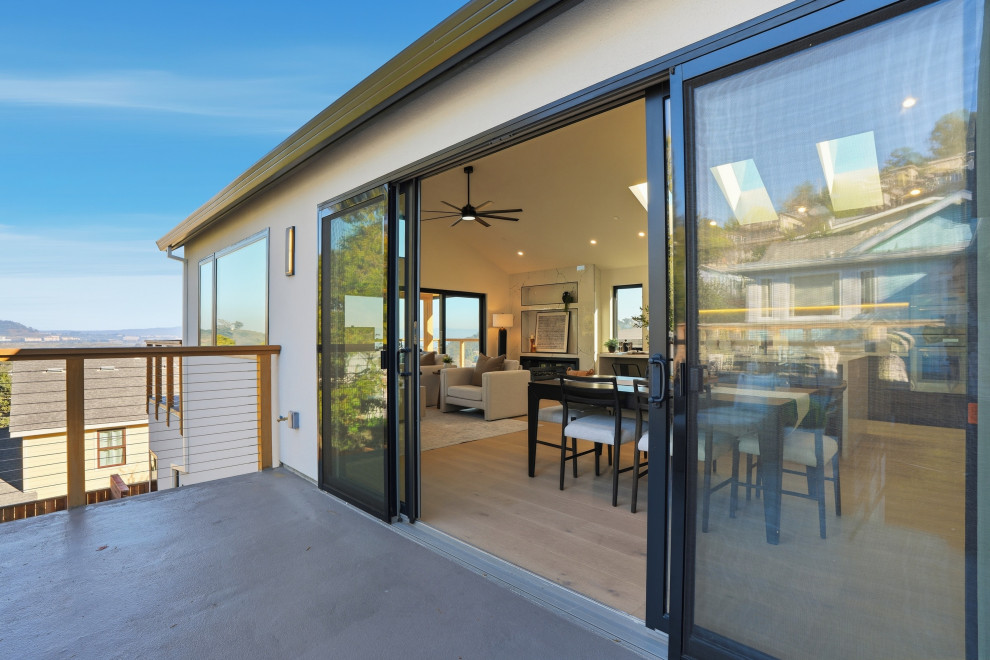 Indoor-Outdoor Dining Area with Large Sliding Glass Doors