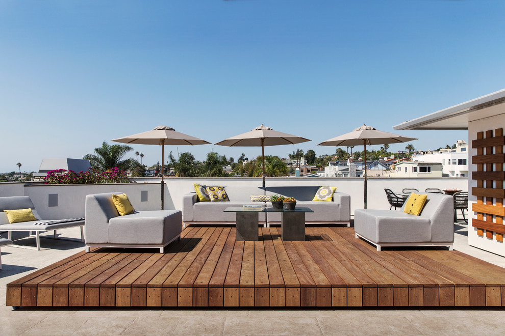 Inspiration for a large contemporary rooftop stone, rectangular and rooftop lap deck remodel in Los Angeles