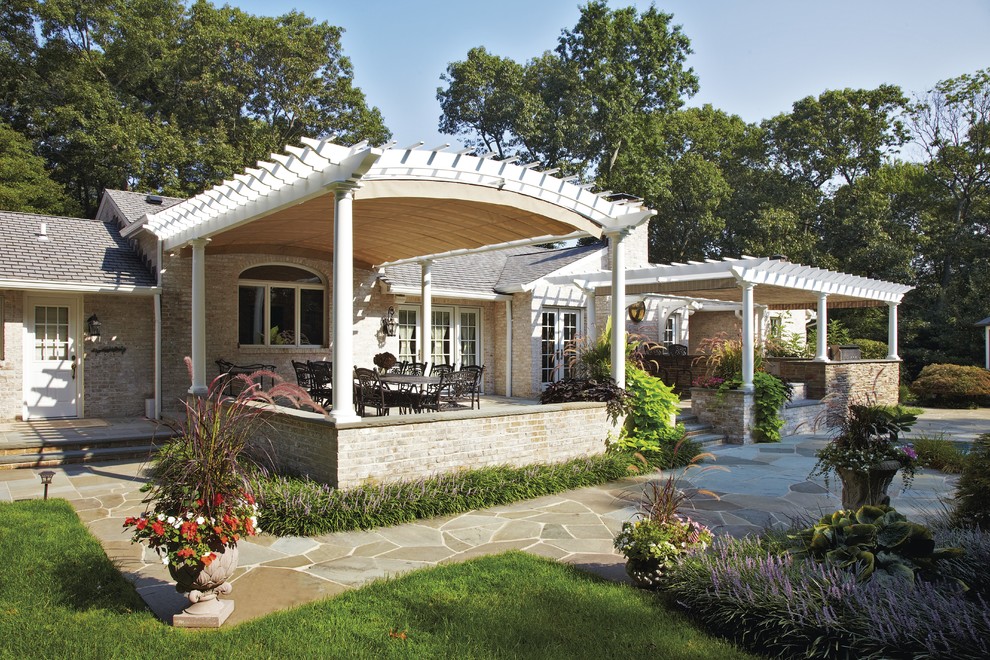 Inspiration for a traditional patio in Other with a pergola.