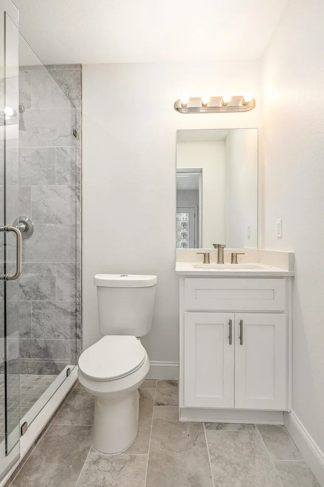 Inspiration for a single-sink bathroom remodel with white cabinets and a built-in vanity