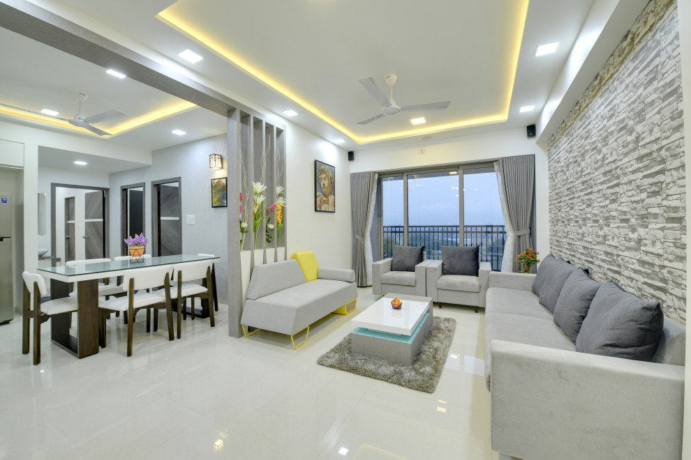 Design ideas for a modern living room in Ahmedabad.