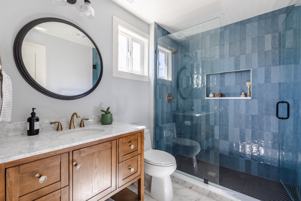 Example of a transitional bathroom design in Denver