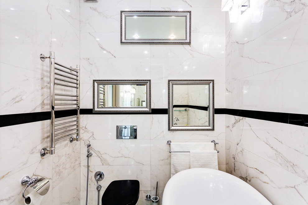 Photo of a contemporary bathroom in Moscow with a two-piece toilet.
