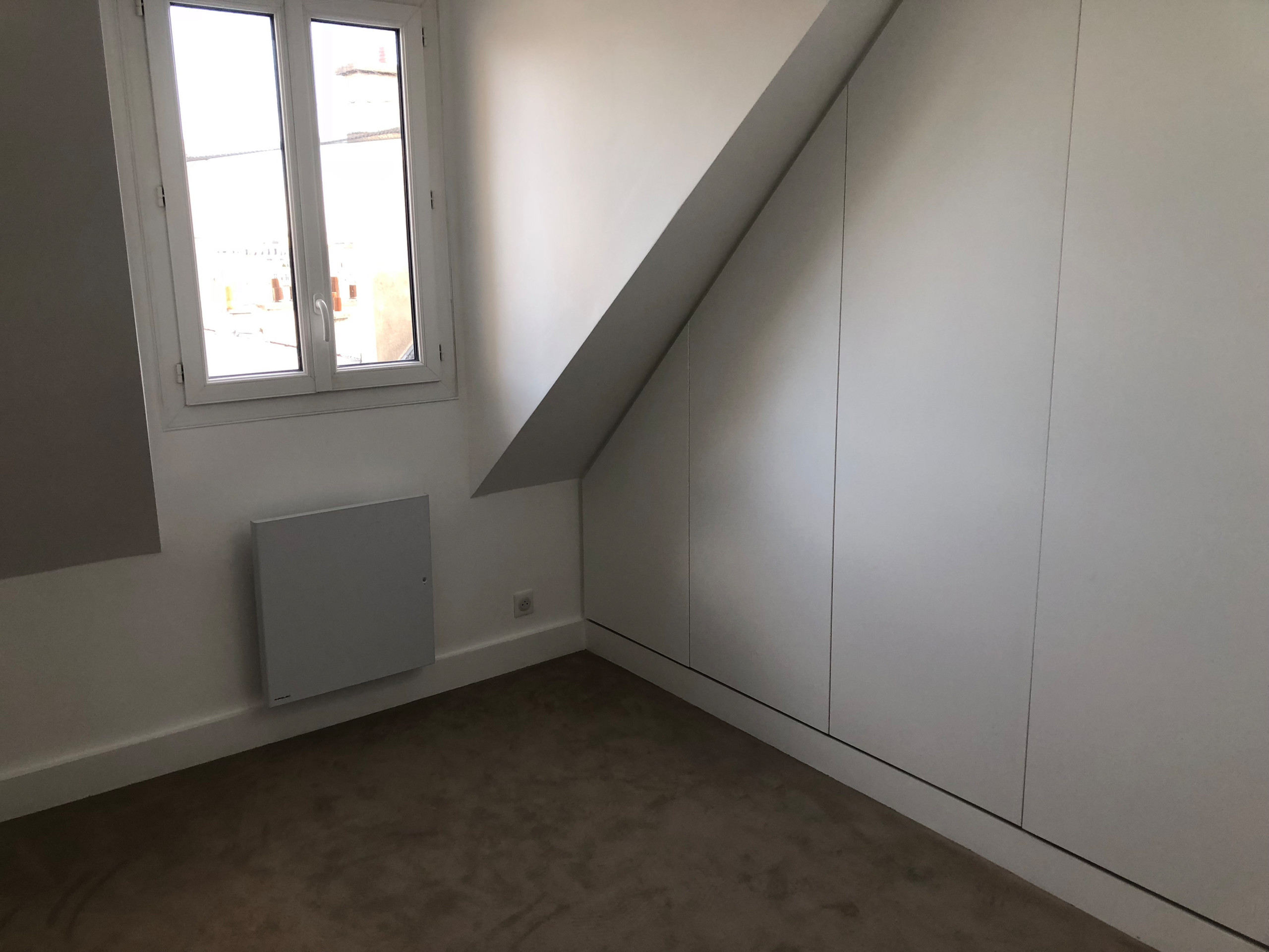 Appartement vue Tour Eiffel sous combles