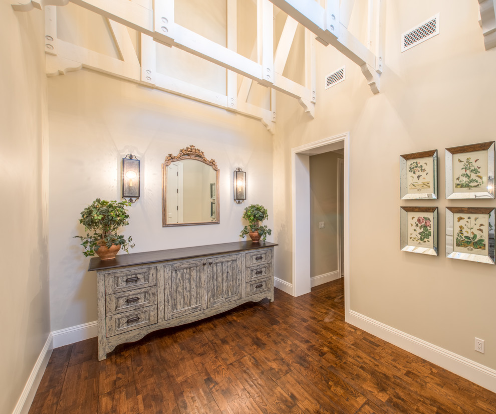 Inspiration for a large transitional hallway in Phoenix with beige walls and medium hardwood floors.