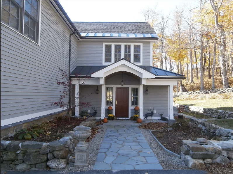 Front door - mid-sized transitional front door idea in Boston with gray walls and a dark wood front door