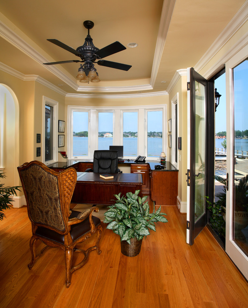 This is an example of a mediterranean home office in Charlotte.