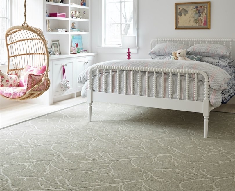 This is an example of a mid-sized traditional nursery for girls in Other with white walls and carpet.