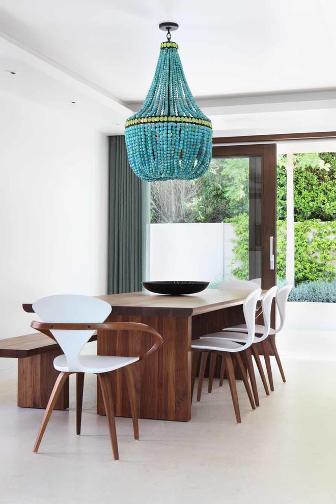 Design ideas for a contemporary dining room in Other with white walls and multi-coloured floor.