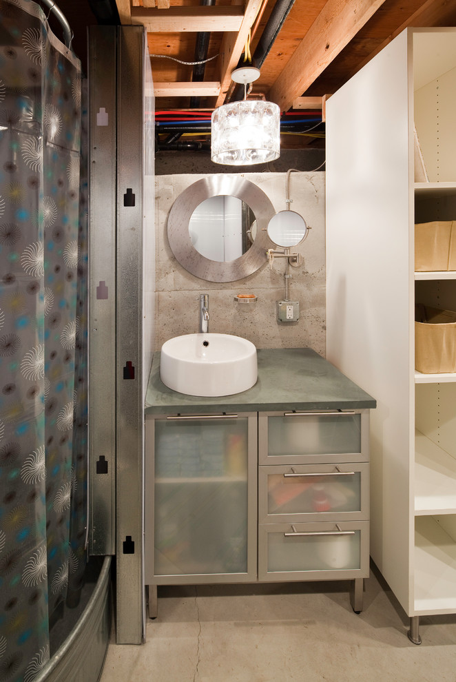 Photo of a contemporary bathroom in Seattle with a vessel sink and a shower curtain.
