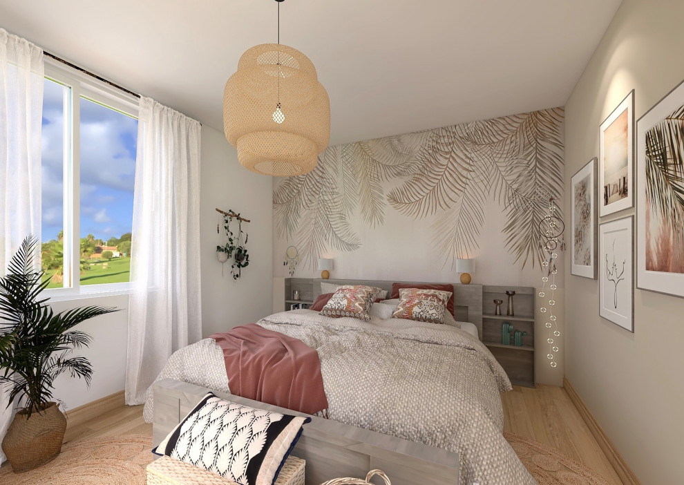 Design ideas for a mid-sized tropical master bedroom in Paris with beige walls, light hardwood floors and beige floor.