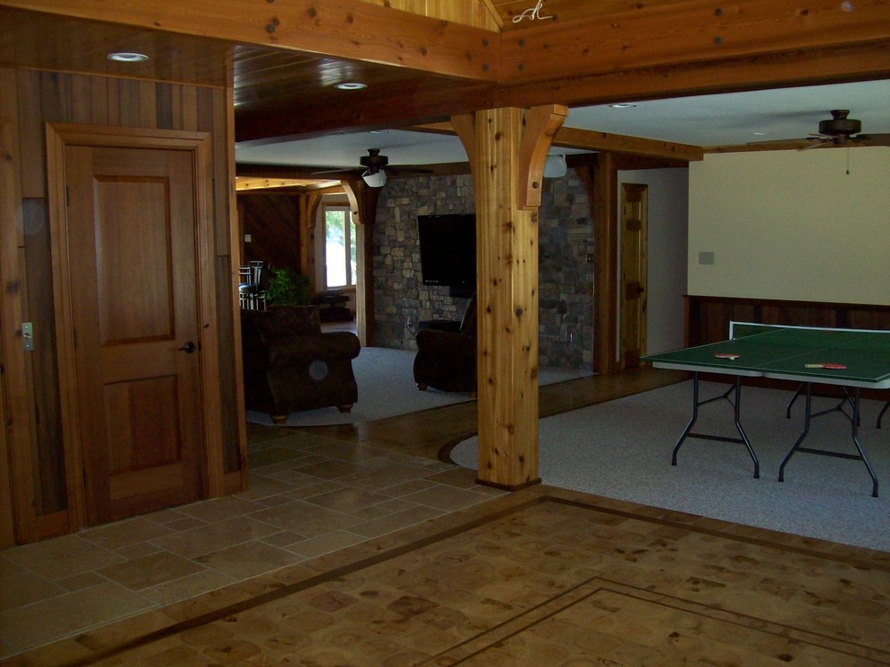 Example of a mountain style basement design in Raleigh