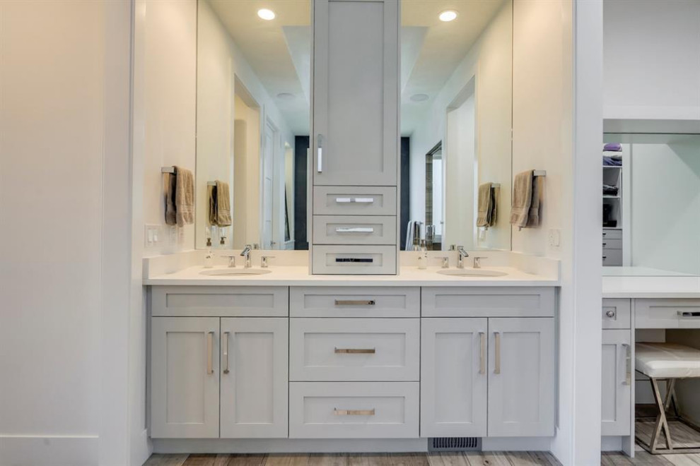 This is an example of a medium sized traditional ensuite bathroom in Calgary with shaker cabinets, grey cabinets, white walls, wood-effect flooring, a submerged sink, engineered stone worktops, turquoise worktops, double sinks, a built in vanity unit and a drop ceiling.