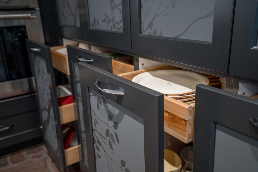 Kitchen - mid-sized transitional kitchen idea in Austin with flat-panel cabinets