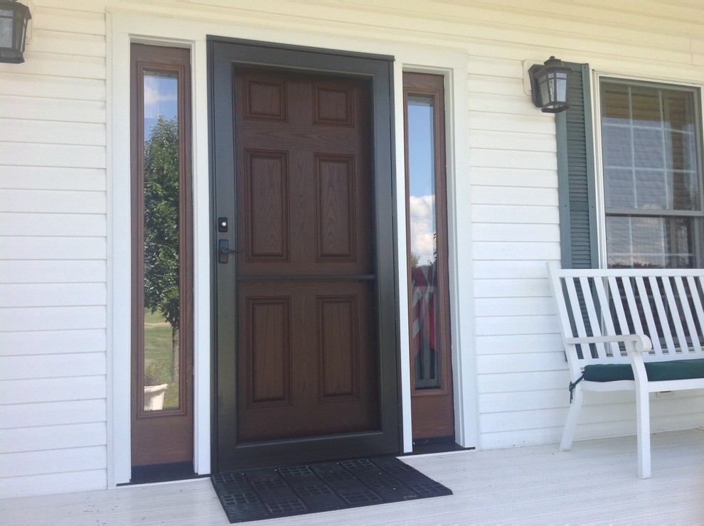 Cherry Stained Fiberglass Entry Door And Storm Door For A