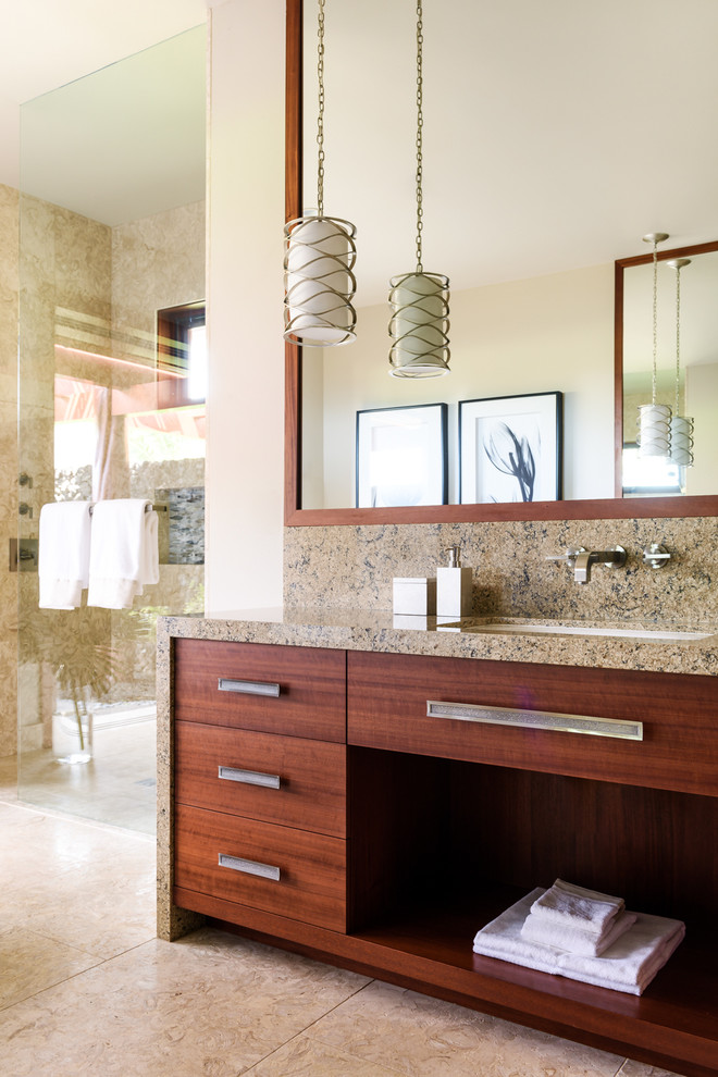 Design ideas for a large tropical master bathroom in Hawaii with flat-panel cabinets, engineered quartz benchtops, dark wood cabinets, a curbless shower, beige tile, beige walls, an undermount sink and an open shower.
