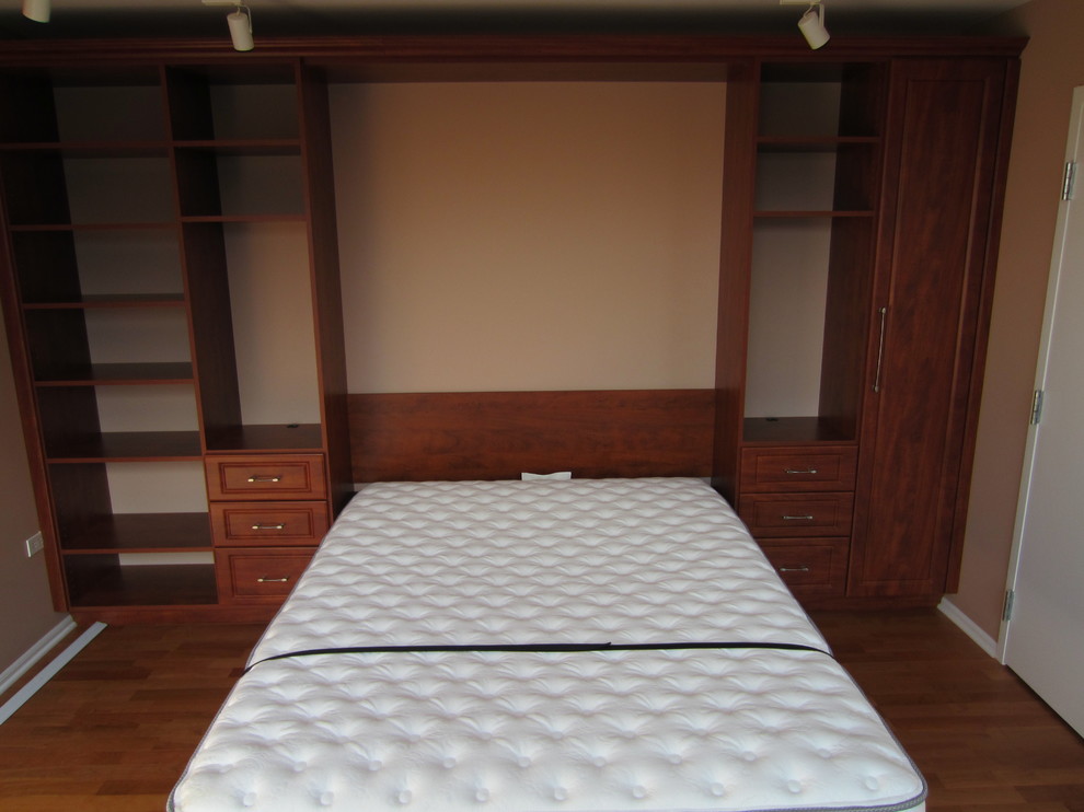 Example of a transitional bedroom design in Chicago