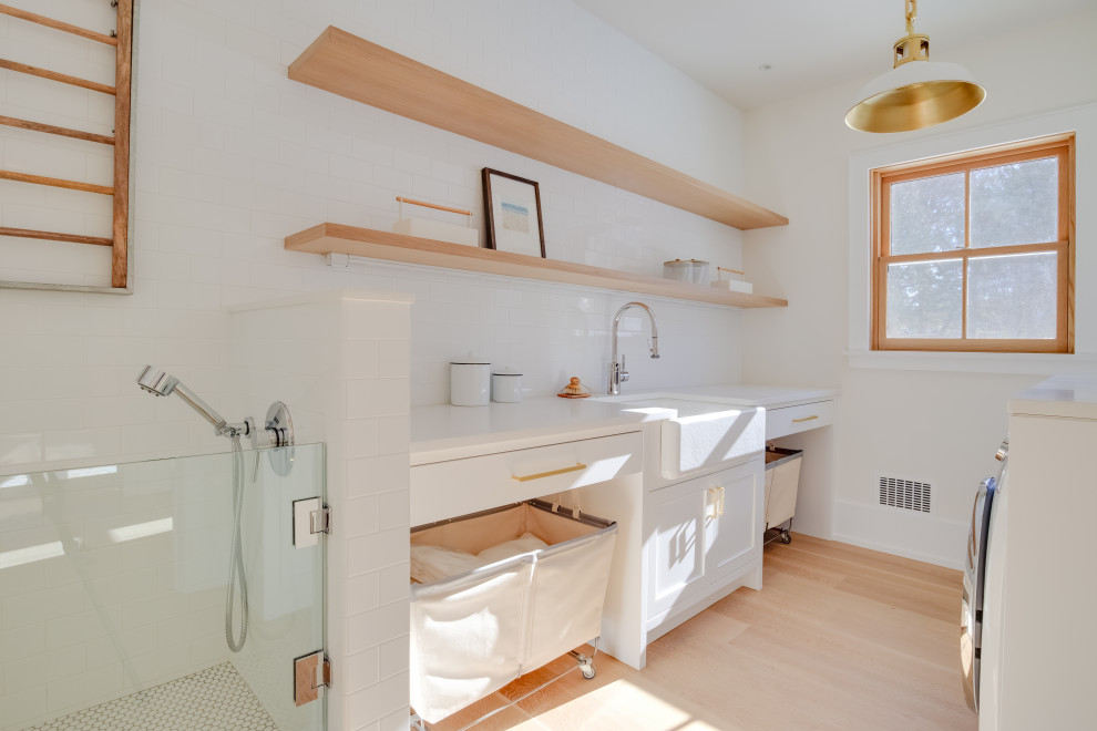 Inspiration for a farmhouse laundry room remodel in New York
