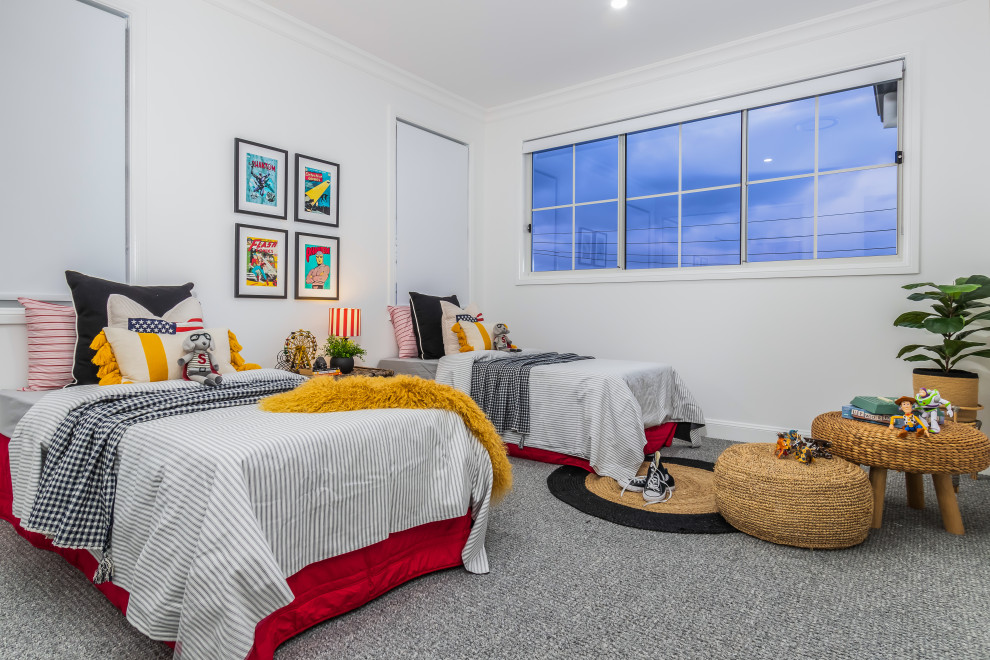 Photo of a beach style kids' bedroom for kids 4-10 years old and boys in Townsville with white walls, carpet and grey floor.