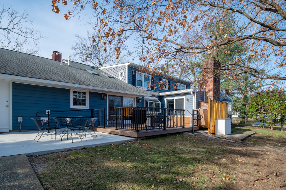 Inspiration for a large backyard ground level metal railing deck remodel in DC Metro