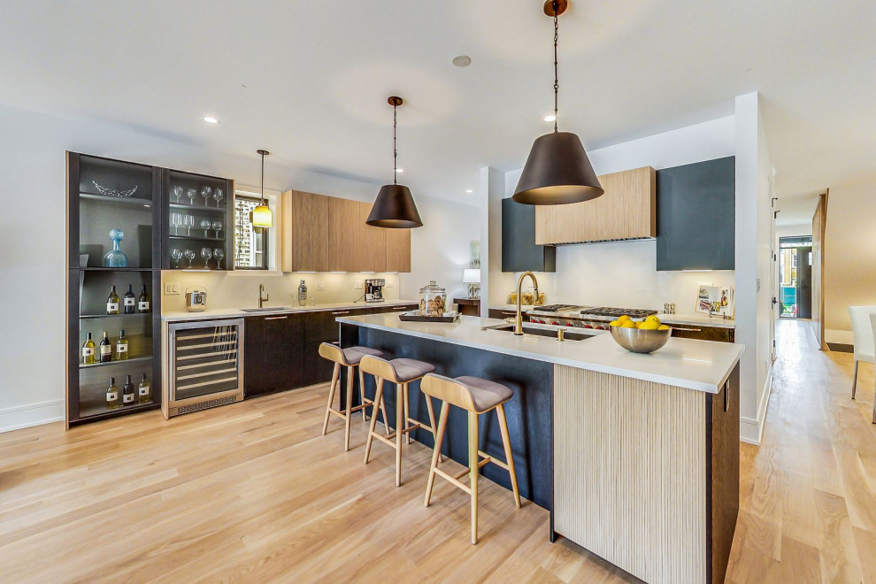 Sophisticated Two-Tone Kitchen With Statement Pendants