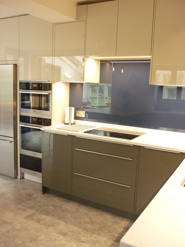 This is an example of a contemporary kitchen in Kent.