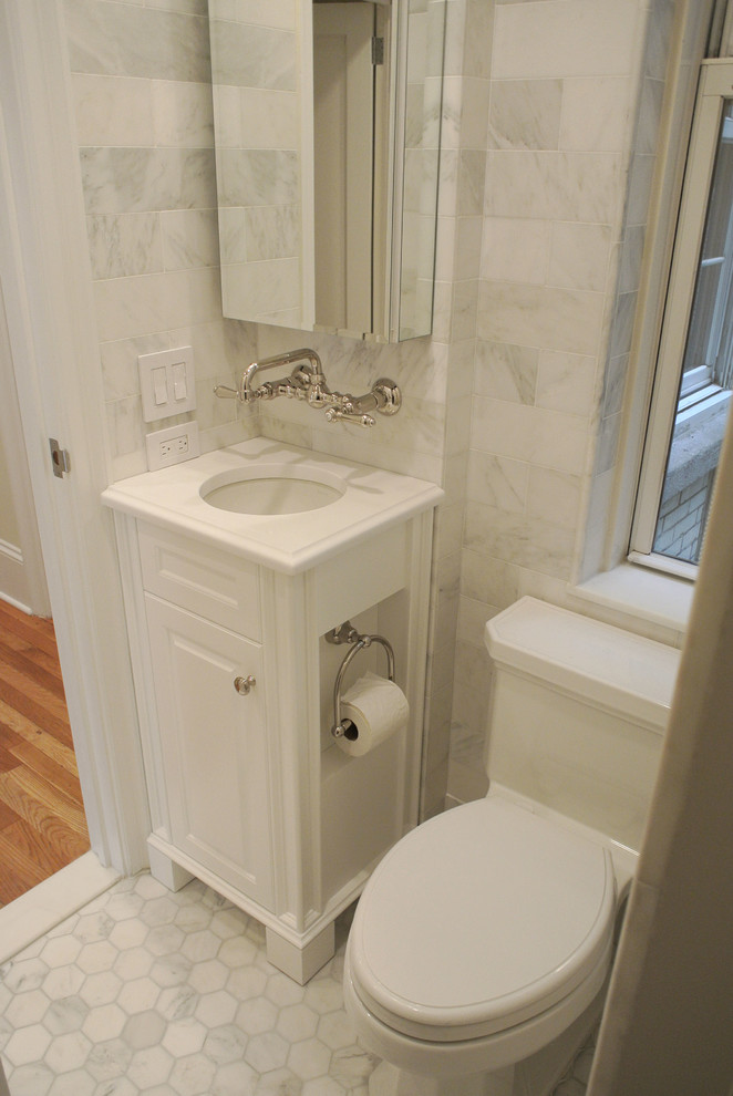 Design ideas for a traditional powder room in New York.