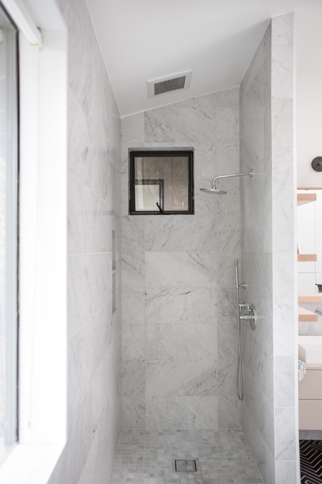 Design ideas for a mid-sized modern master bathroom in Los Angeles with flat-panel cabinets, beige cabinets, a freestanding tub, an open shower, a two-piece toilet, white tile, marble, white walls, marble floors, a vessel sink, multi-coloured floor and an open shower.