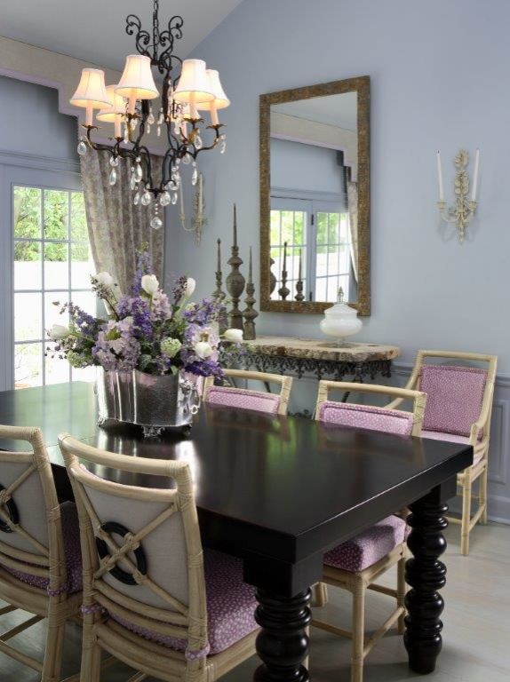 This is an example of a mid-sized transitional separate dining room in Atlanta with grey walls and light hardwood floors.