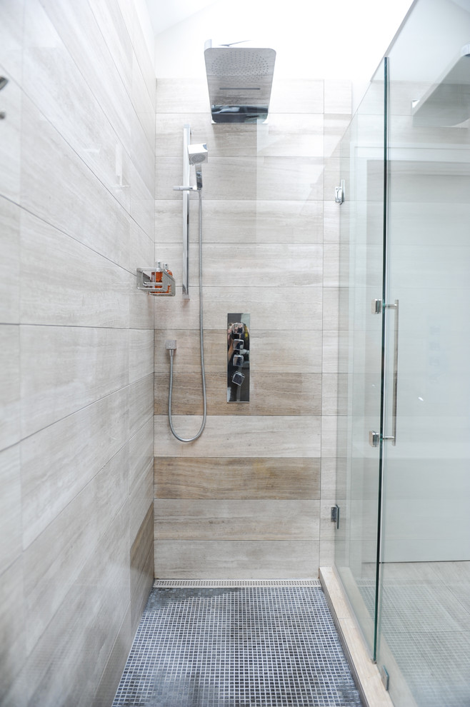 Design ideas for a mid-sized contemporary master bathroom in Vancouver with a corner shower, a corner tub, stone tile, limestone floors, flat-panel cabinets, medium wood cabinets and white walls.