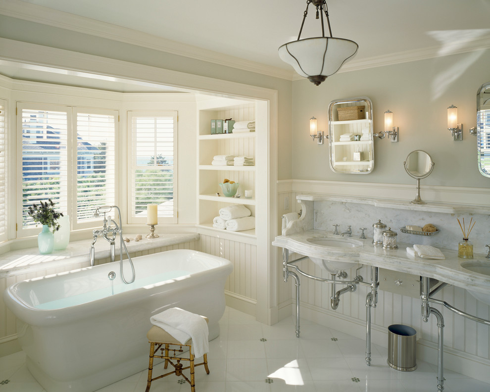 Design ideas for a traditional bathroom in Boston with a console sink and a freestanding tub.
