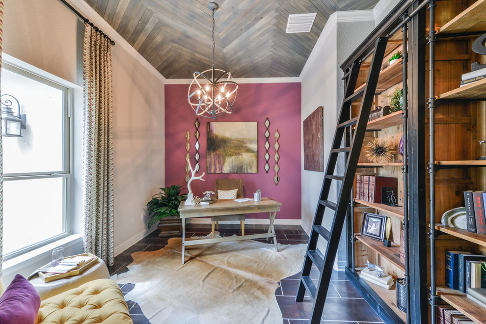 Inspiration for a transitional study room in Austin with a freestanding desk and pink walls.