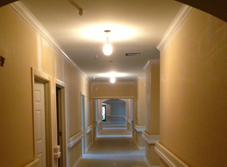 Example of a huge transitional home design design with beige walls
