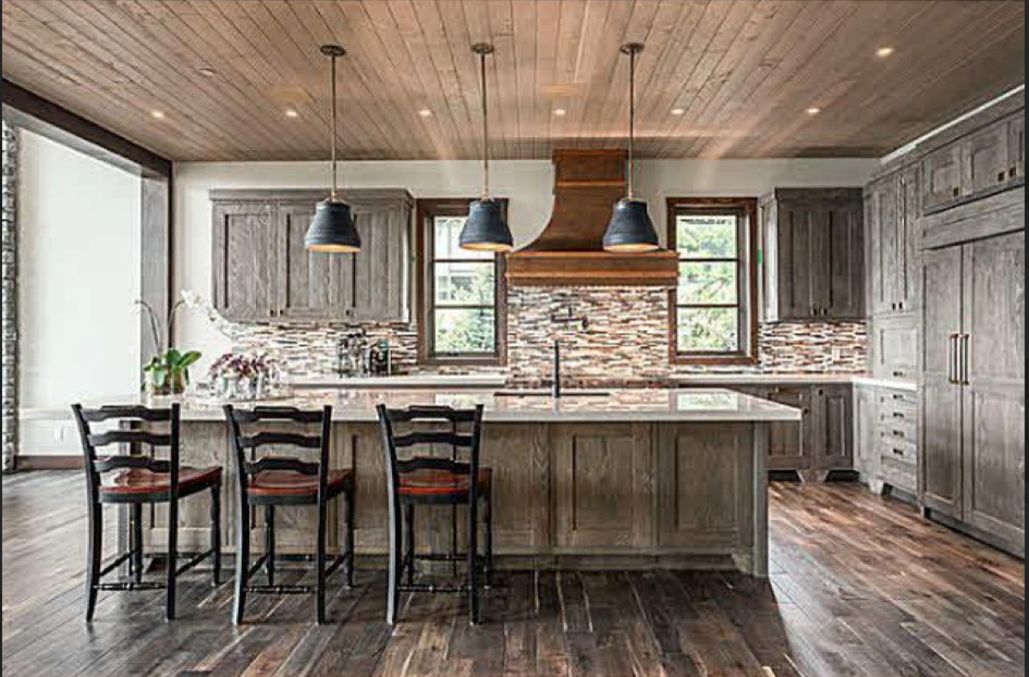 Inspiration for a large transitional l-shaped dark wood floor and brown floor open concept kitchen remodel in Vancouver with an undermount sink, shaker cabinets, gray cabinets, multicolored backsplash, matchstick tile backsplash, an island and paneled appliances